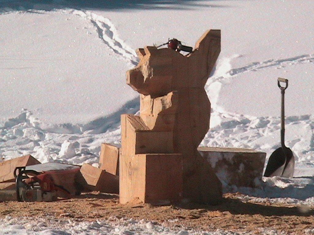 Wooden sculpture of a bear in progress