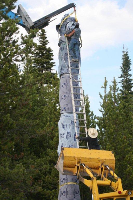 Totem pole being assembled