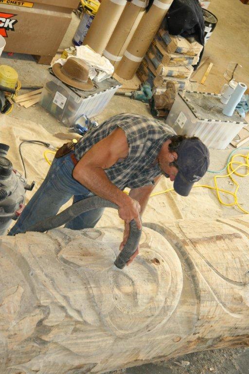 Todd Fredericksen working on the totem pole