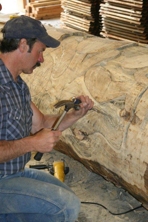 Todd Fredericksen carving the totem pole